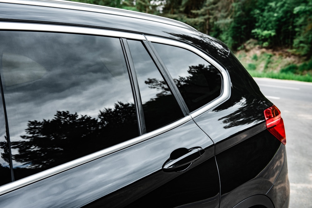 Is Tinting Right for My Vehicle's Windows? 2 Modern car with tint back windows.